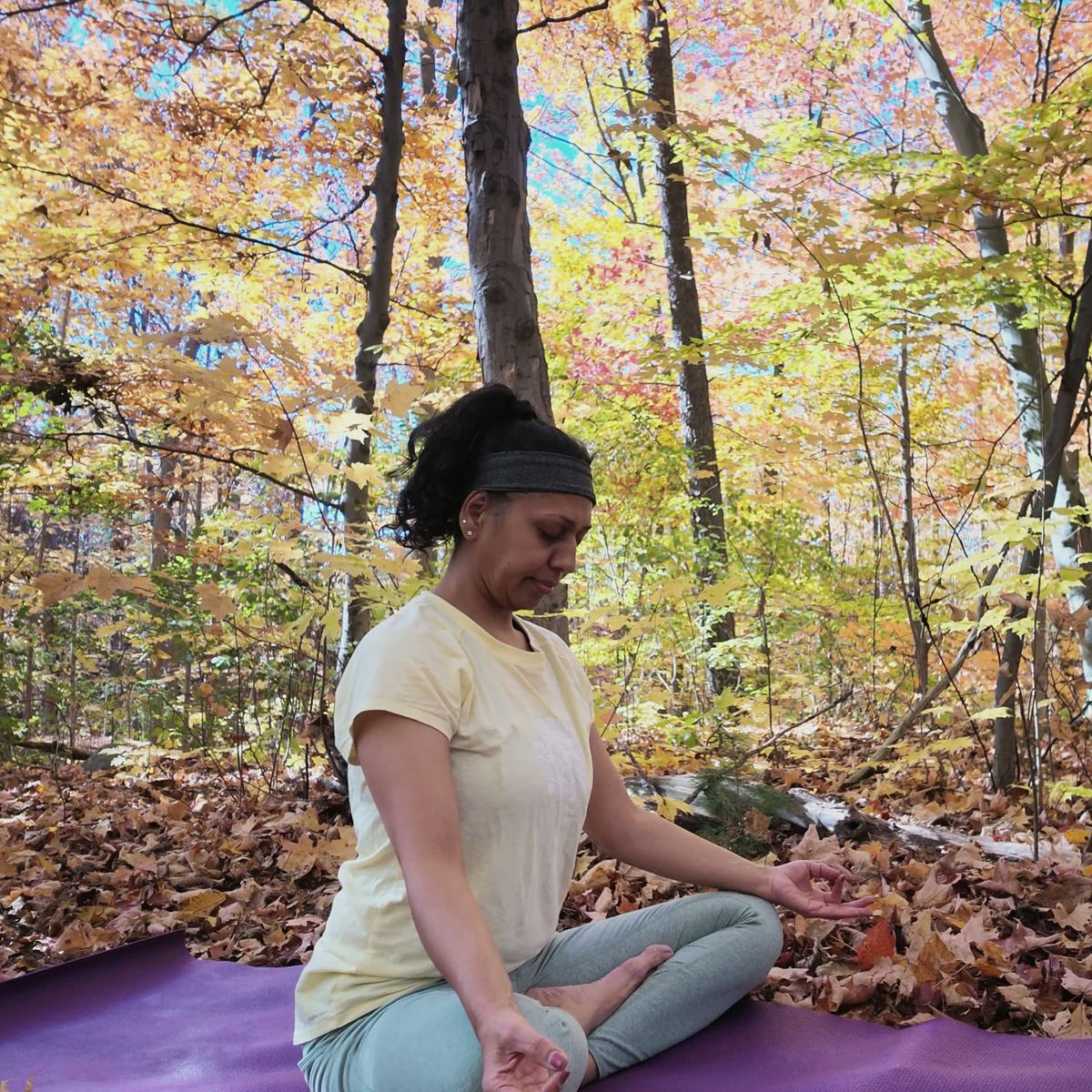 Sneh Lata seated in lotus with hands in a mudra