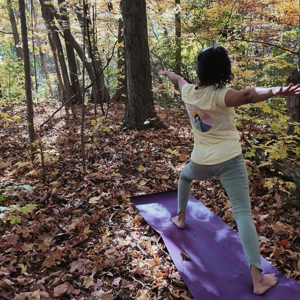 Sneh Lata in a warrior pose with arms extended